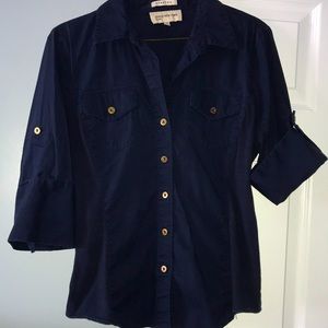 Navy blue button up top. 3/4 arm length.